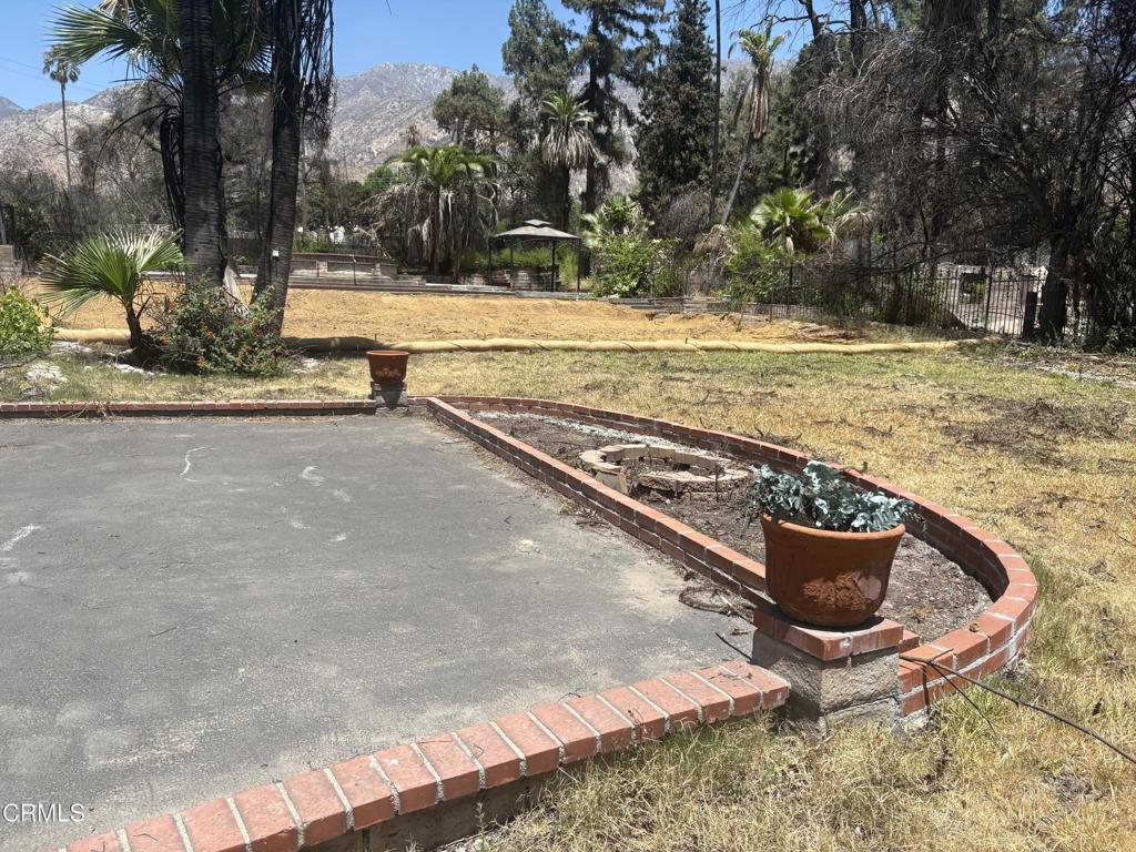 1125 Rubio Street Altadena, CA 91001 - Photo 12 of 23 a view of a swimming pool with a yard