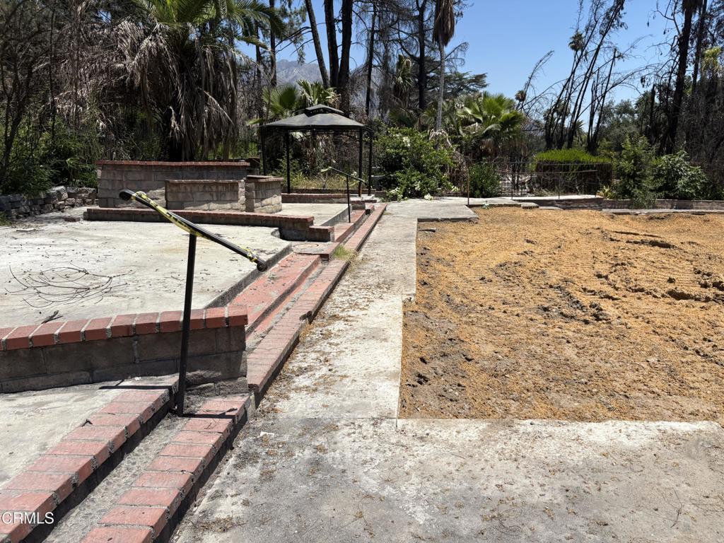 1125 Rubio Street Altadena, CA 91001 - Photo 15 of 23 a view of a backyard with chairs