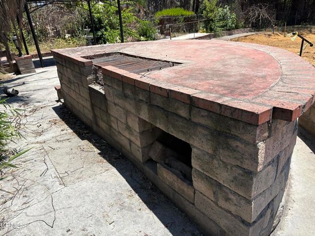 a view of a backyard of a house