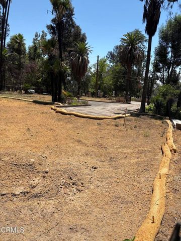 a view of swimming pool with a yard