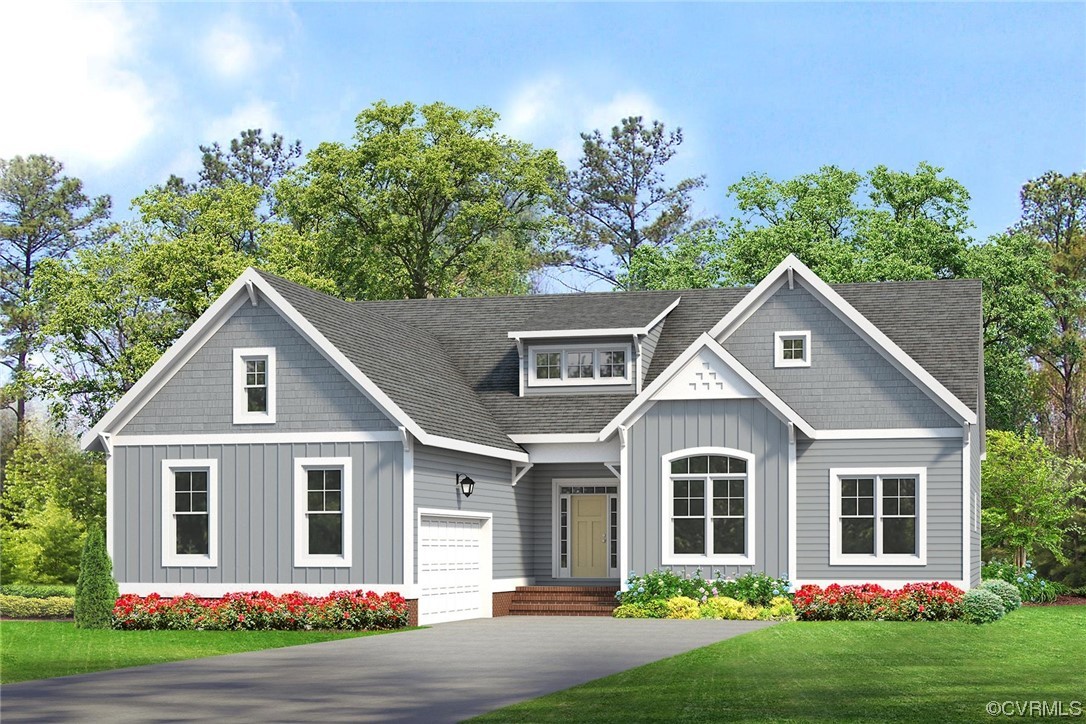 11734 Kings Pond Drive Providence Forge, VA 23140 - Photo 1 of 17 a front view of a house with garden