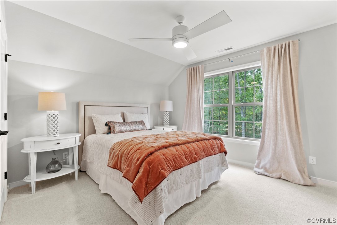 11734 Kings Pond Drive Providence Forge, VA 23140 - Photo 11 of 17 a bedroom with a bed and a window