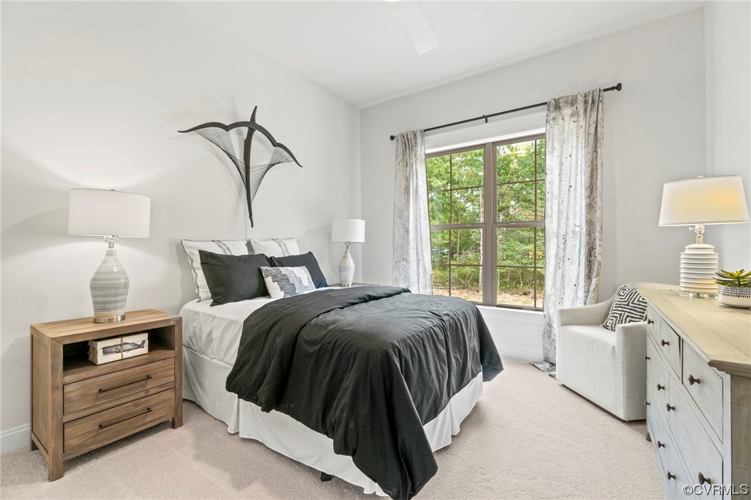 11734 Kings Pond Drive Providence Forge, VA 23140 - Photo 12 of 17 a bedroom with a bed and a window