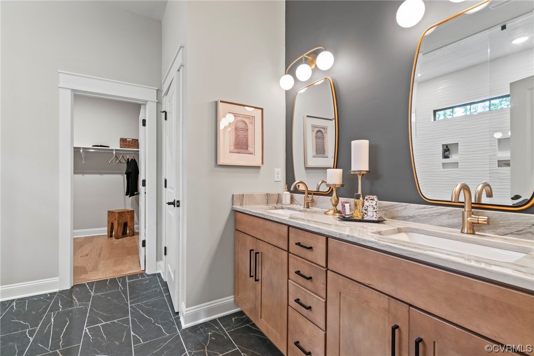 11734 Kings Pond Drive Providence Forge, VA 23140 - Photo 14 of 17 a bathroom with a sink and a mirror