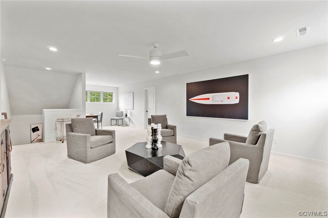 11734 Kings Pond Drive Providence Forge, VA 23140 - Photo 16 of 17 a living room with furniture and a flat screen tv