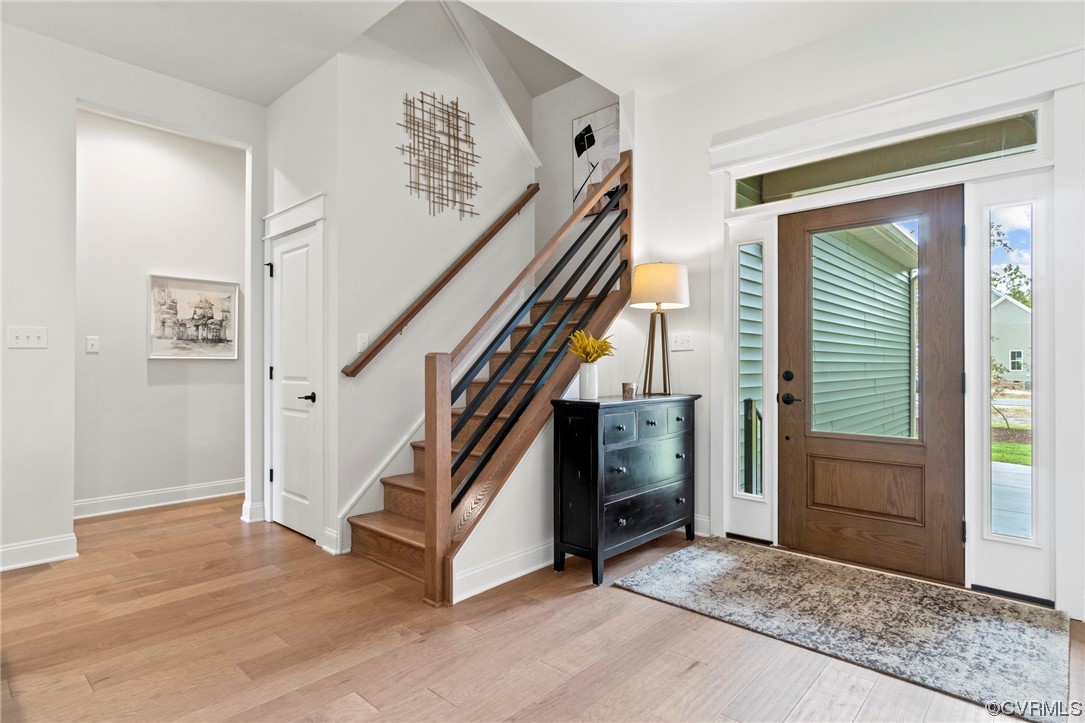 11734 Kings Pond Drive Providence Forge, VA 23140 - Photo 2 of 17 a view of entryway and hall with wooden floor