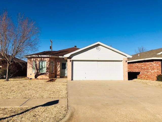 4412 Jarvis Street, Unit 2 Lubbock, TX 79416 - Photo 1 of 16 a view of a house with snow in front of it