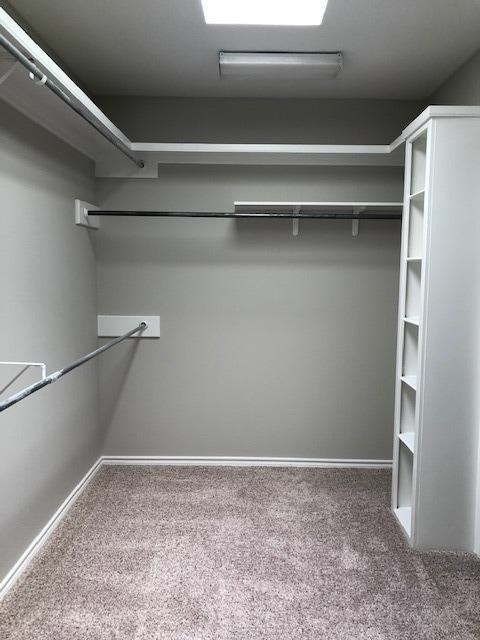 4412 Jarvis Street, Unit 2 Lubbock, TX 79416 - Photo 11 of 16 a view of a room with racks on the wall