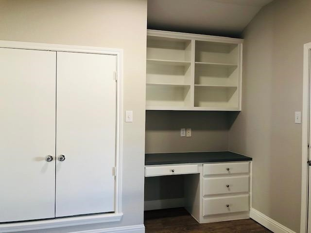4412 Jarvis Street, Unit 2 Lubbock, TX 79416 - Photo 14 of 16 a room with a desk and closet