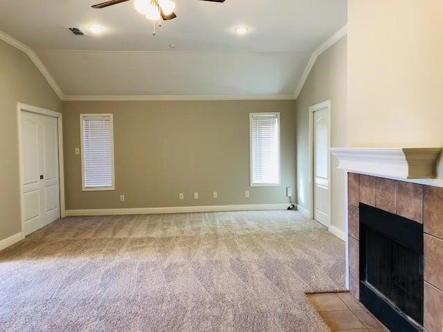 4412 Jarvis Street, Unit 2 Lubbock, TX 79416 - Photo 4 of 16 an empty room with windows and fireplace
