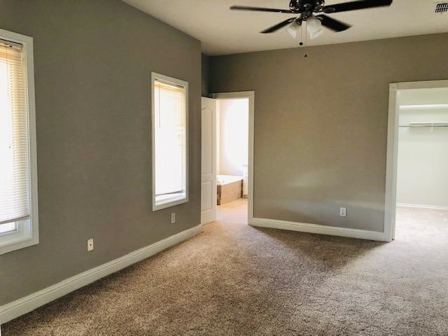 4412 Jarvis Street, Unit 2 Lubbock, TX 79416 - Photo 6 of 16 a view of an empty room with a window