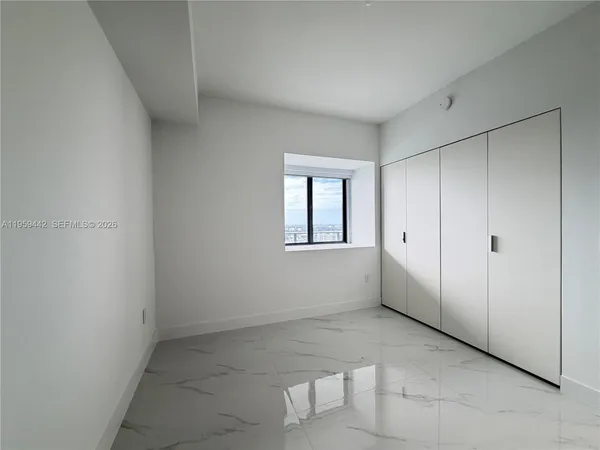 an empty room with windows