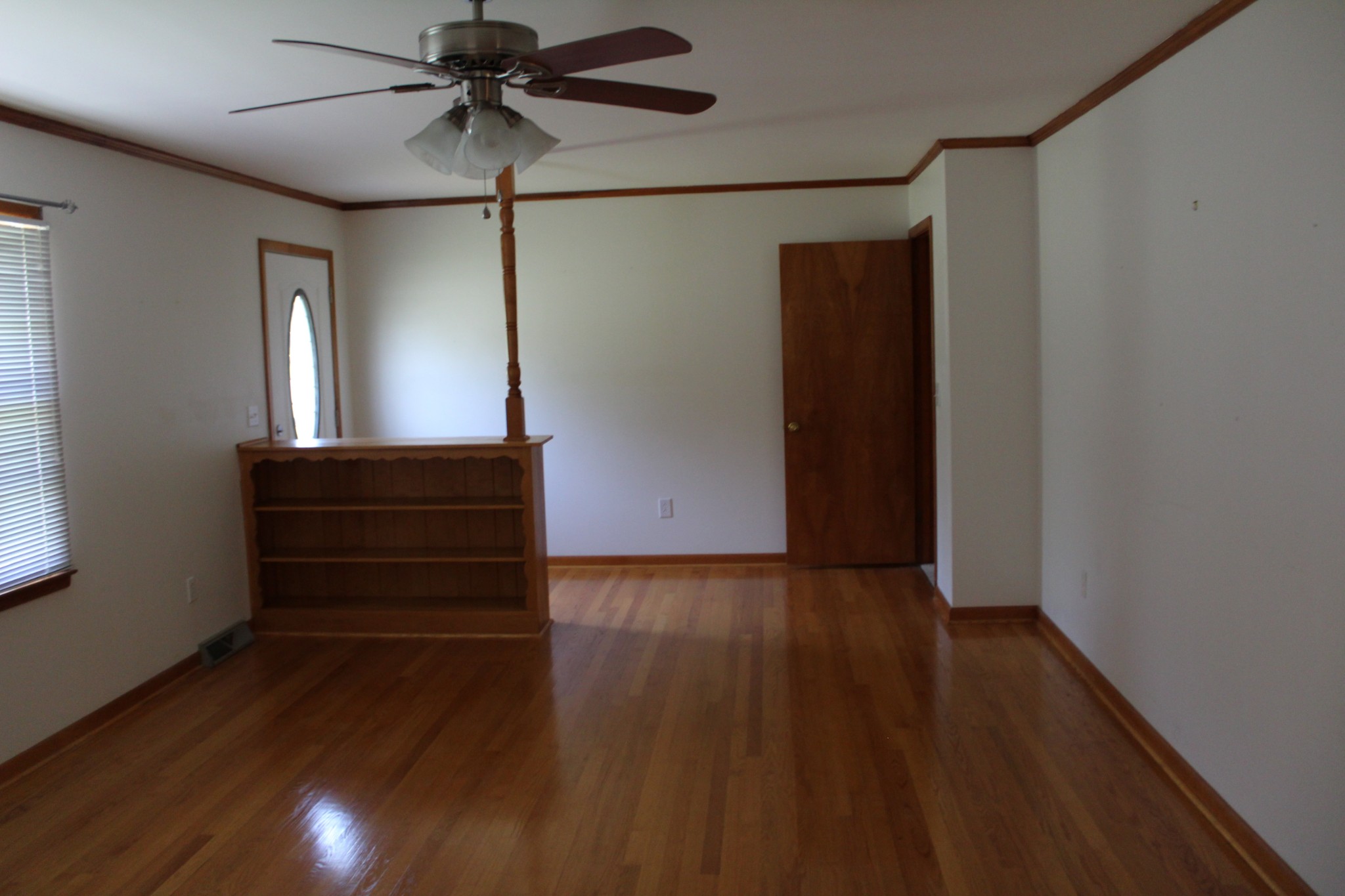 239 Mill Street Viola, TN 37357 - Photo 14 of 27 a view of room with wooden floor and window