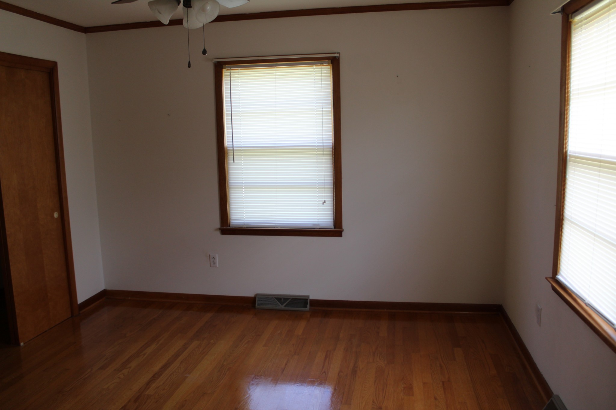 239 Mill Street Viola, TN 37357 - Photo 18 of 27 an empty room with wooden floor and windows