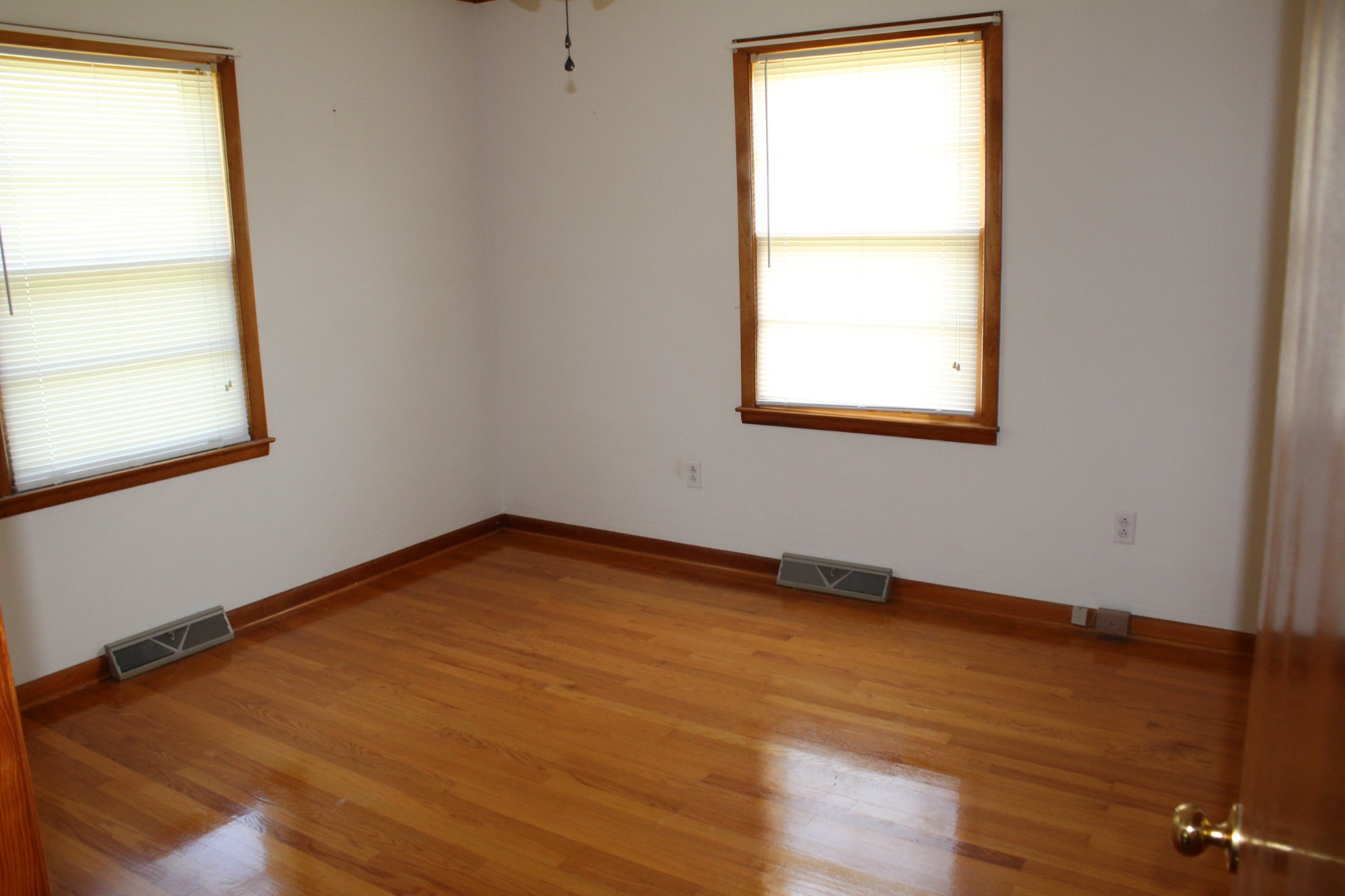 239 Mill Street Viola, TN 37357 - Photo 19 of 27 a view of an empty room with wooden floor and a window