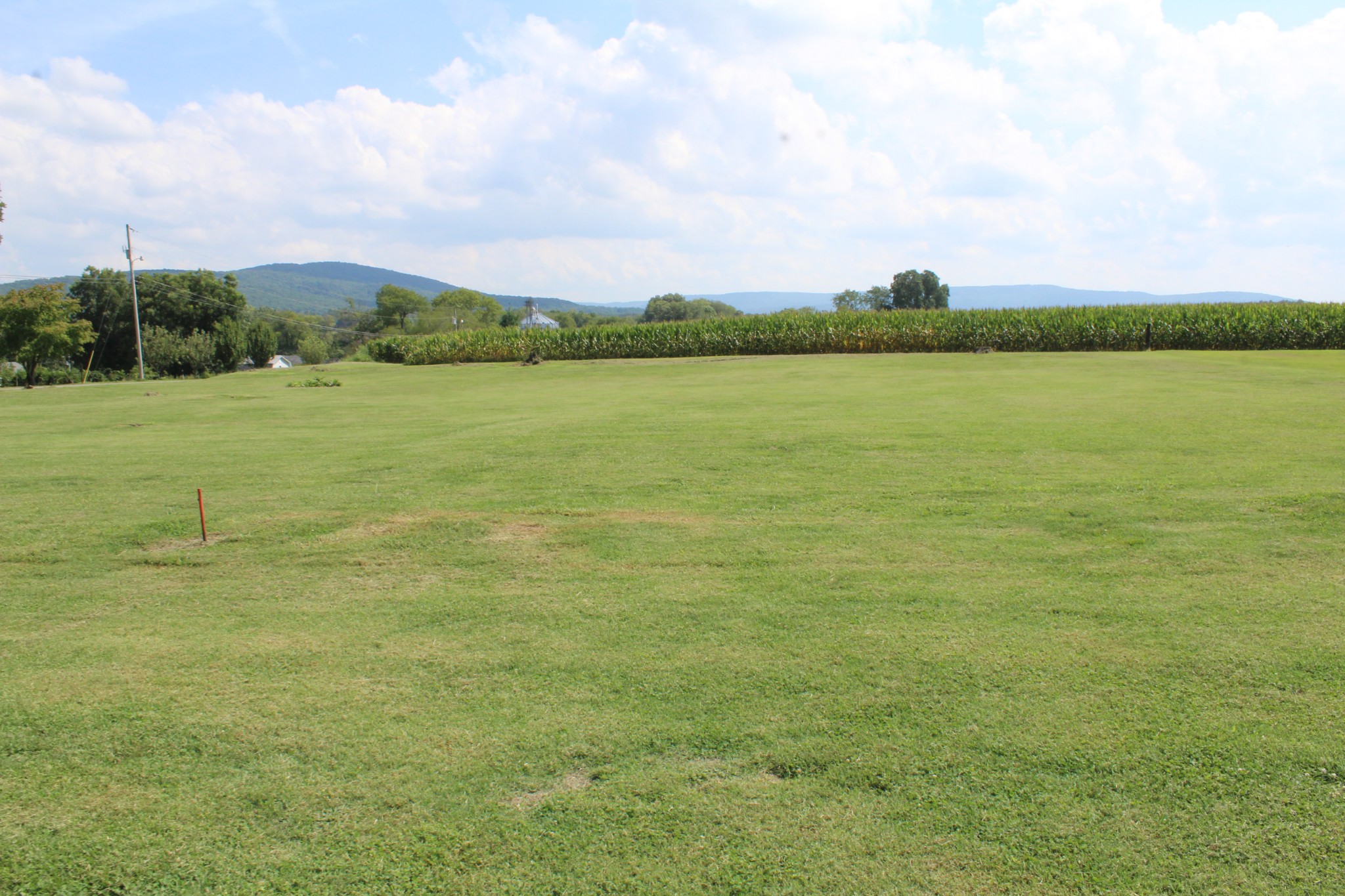 239 Mill Street Viola, TN 37357 - Photo 3 of 27 a view of a lake with a big yard