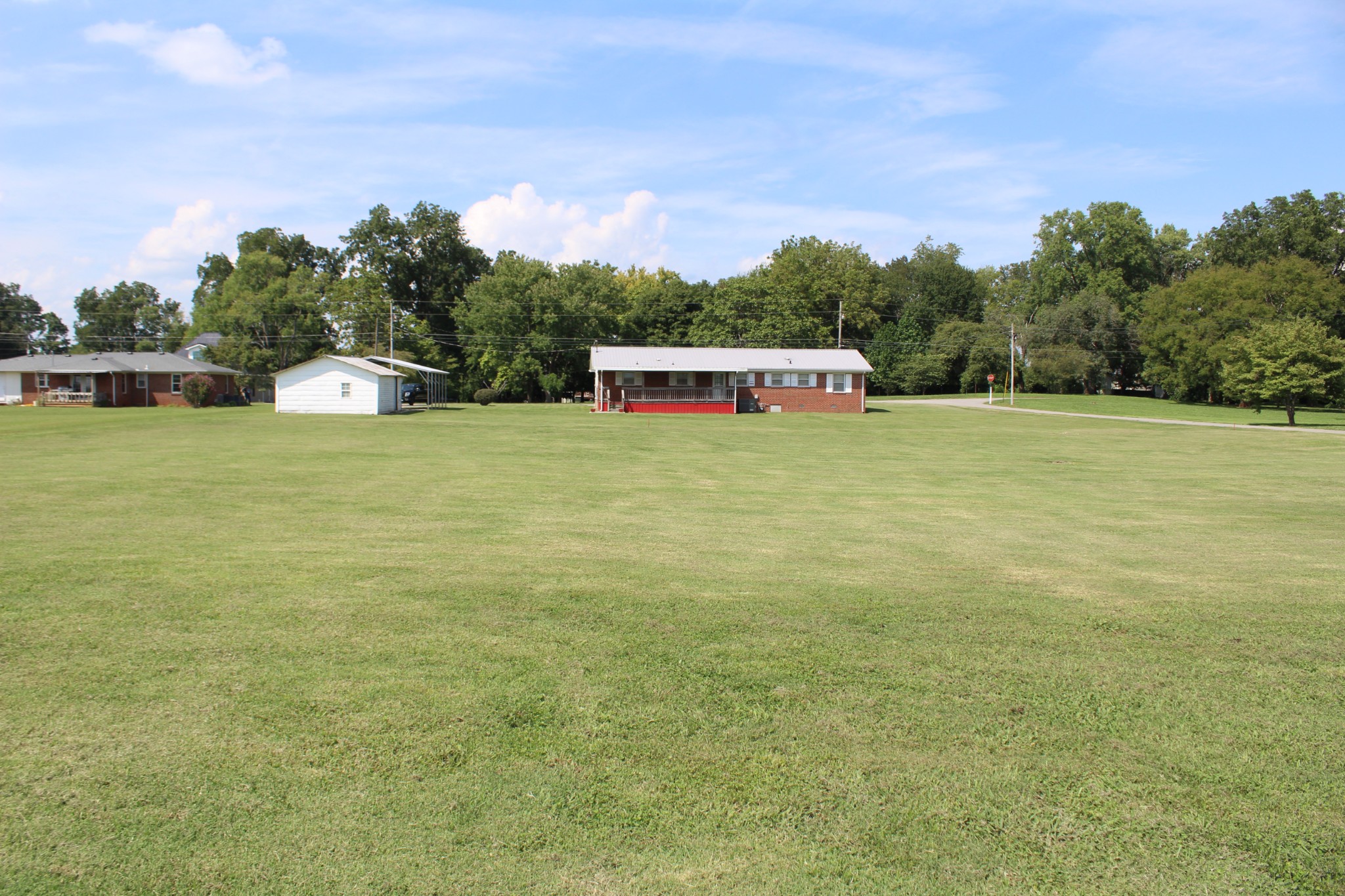 239 Mill Street Viola, TN 37357 - Photo 4 of 27 a house with a garden