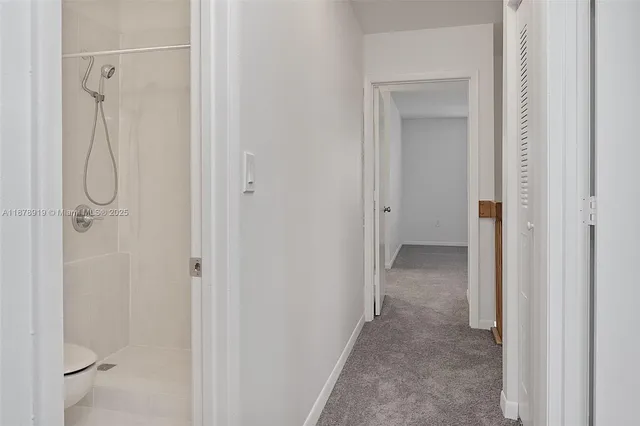 a view of a bathroom from a bathroom