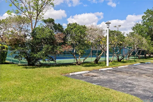 a view of a park with swings