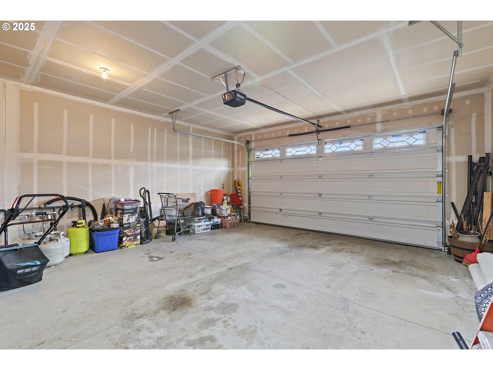 2812 Northeast 120th Avenue Vancouver, WA 98682 - Photo 22 of 27 a view of a garage with a lot of stuff