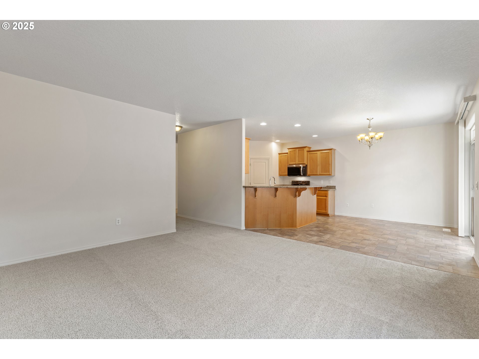 2812 Northeast 120th Avenue Vancouver, WA 98682 - Photo 7 of 27 a view of a kitchen with a sink and a kitchen counter top