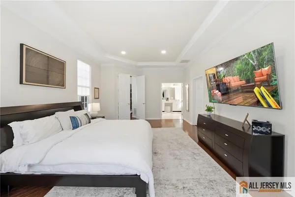 a white bath tub sitting next to a window