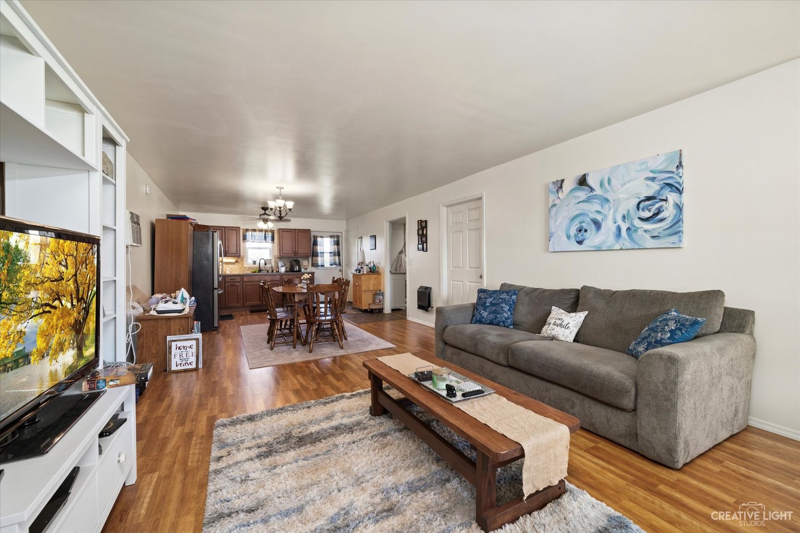 2820 Chicago Road Compton, IL 61318 - Photo 24 of 41 a living room with furniture and a flat screen tv