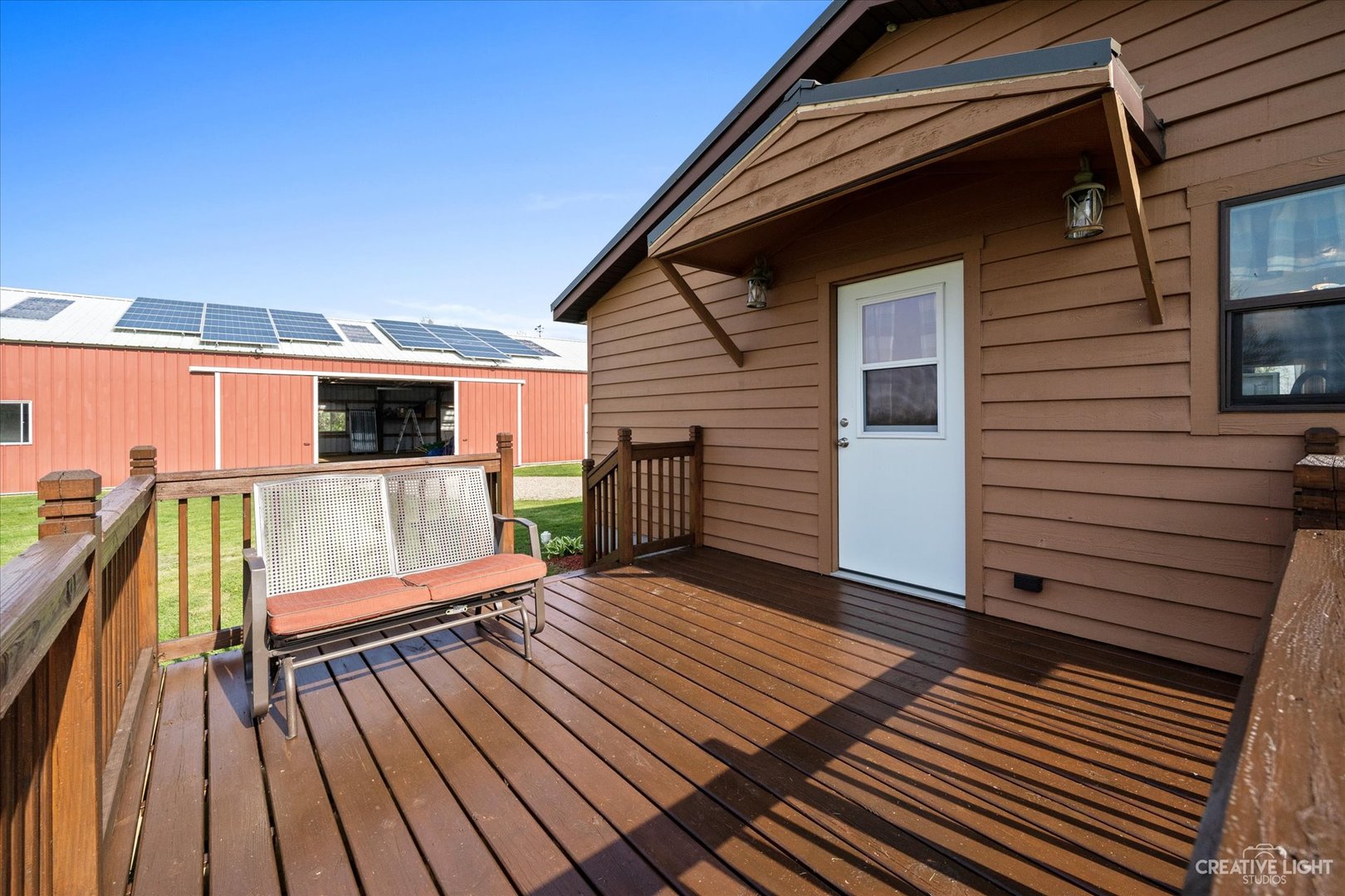 2820 Chicago Road Compton, IL 61318 - Photo 31 of 41 a view of a roof deck with wooden floor and fence