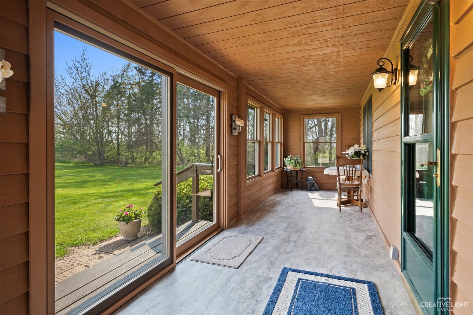 2820 Chicago Road Compton, IL 61318 - Photo 4 of 41 a view of a porch with chairs and backyard