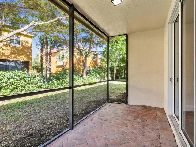 a view of a room with a large window