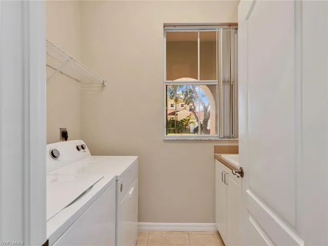 a bathroom with a sink and a window