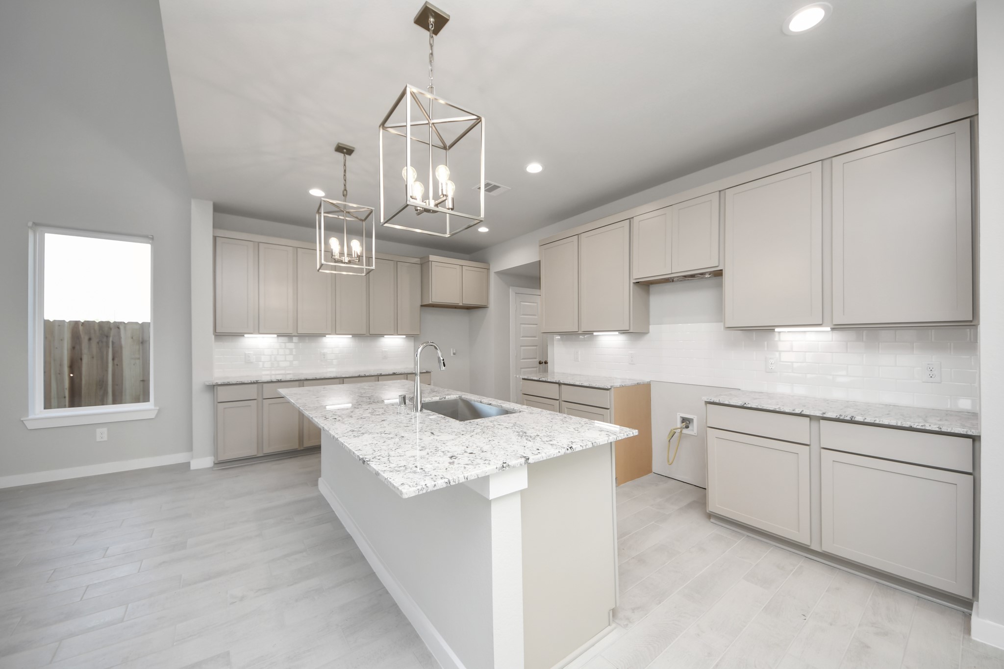 2934 Burris Park Drive Spring, TX 77373 - Photo 11 of 35 This generously spacious kitchen is a dream realized! Sample photo of completed home with similar floor plan. Actual colors and selections may vary.