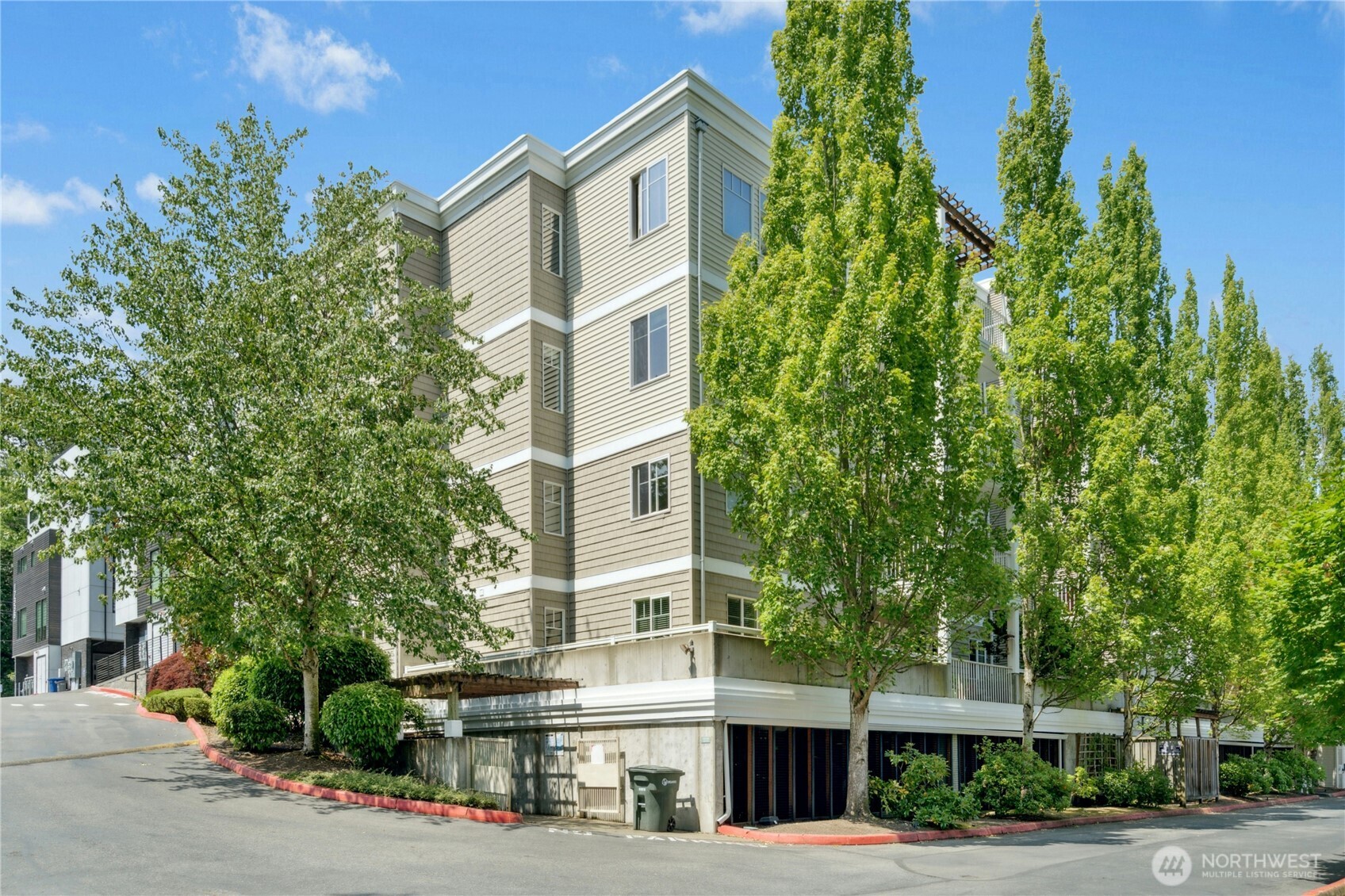 17426 Bothell Way Northeast, Unit A105 Bothell, WA 98011 - Photo 1 of 29 a view of a building with a street