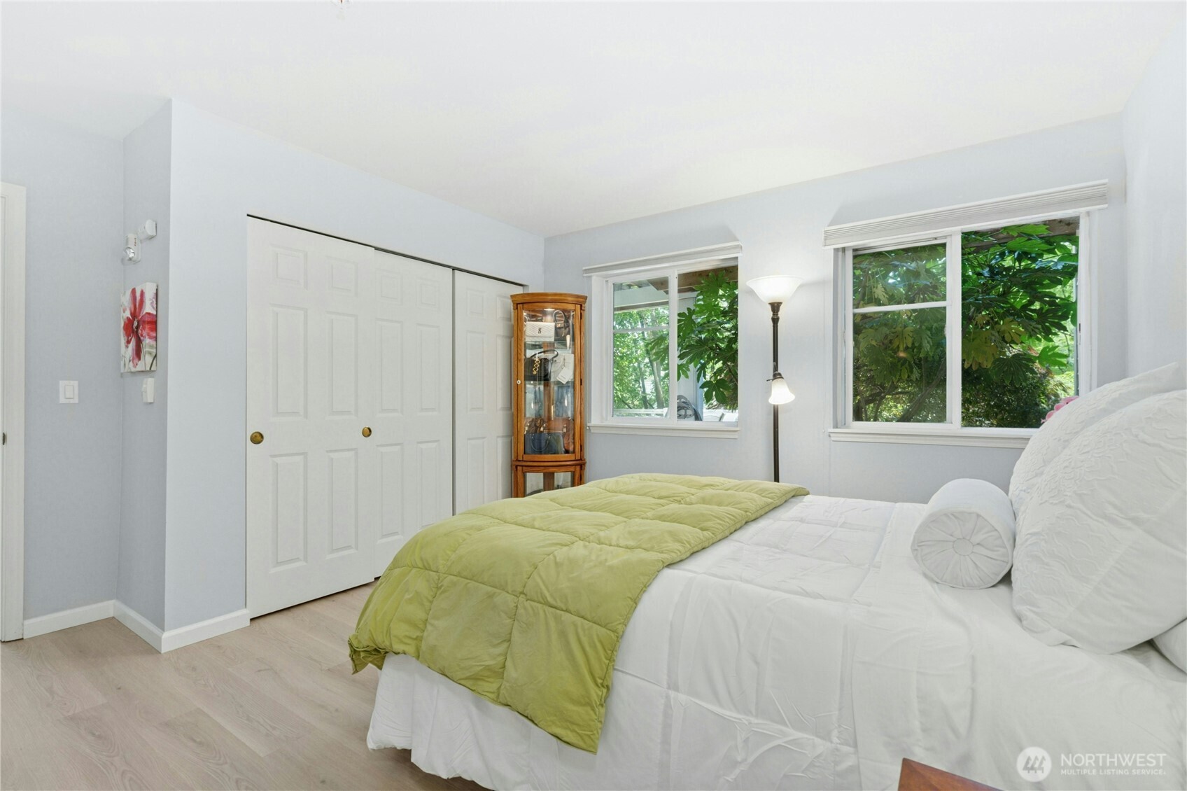 17426 Bothell Way Northeast, Unit A105 Bothell, WA 98011 - Photo 14 of 29 a bedroom with a bed and a window