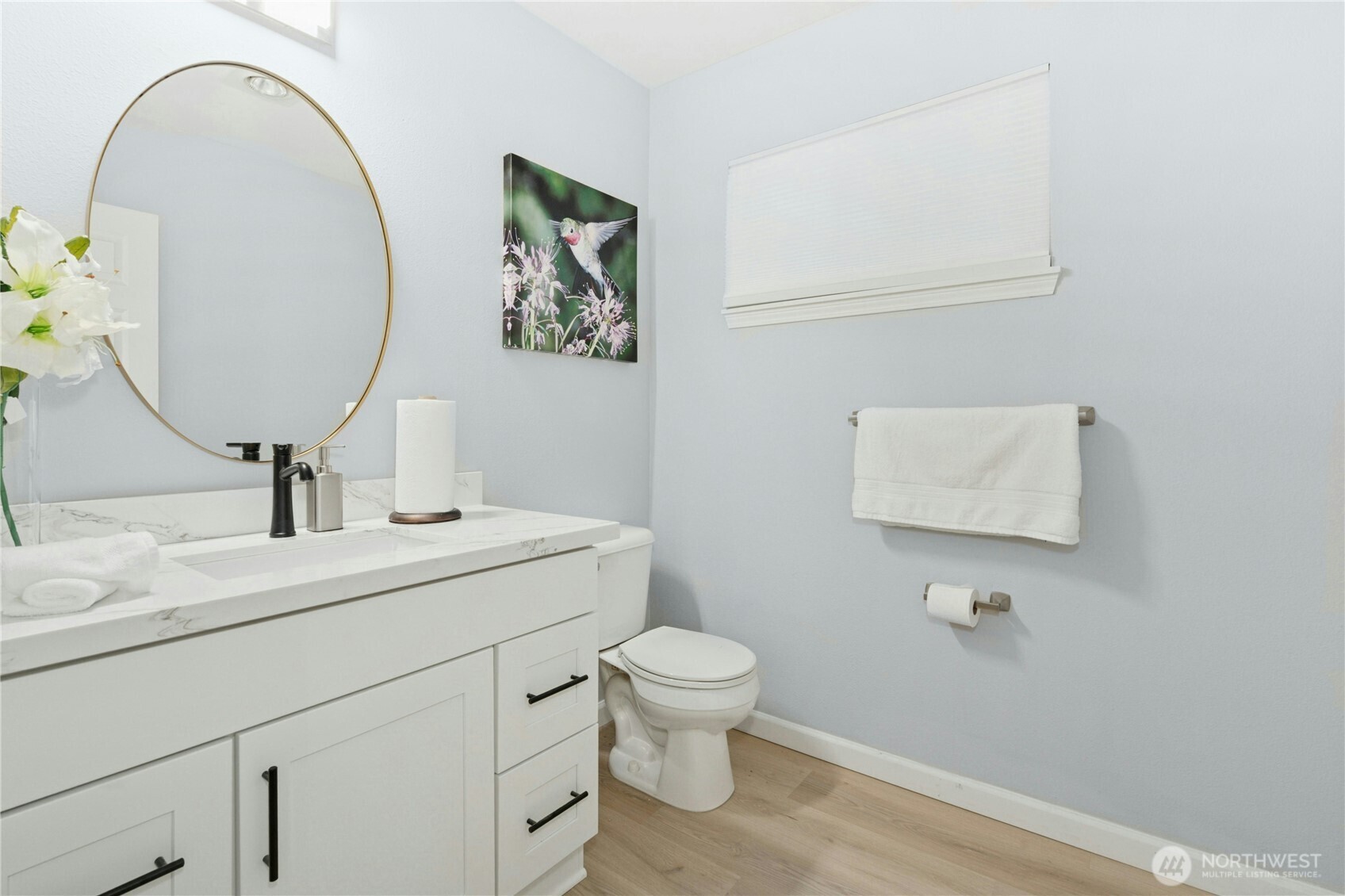 17426 Bothell Way Northeast, Unit A105 Bothell, WA 98011 - Photo 18 of 29 a bathroom with a toilet sink and mirror