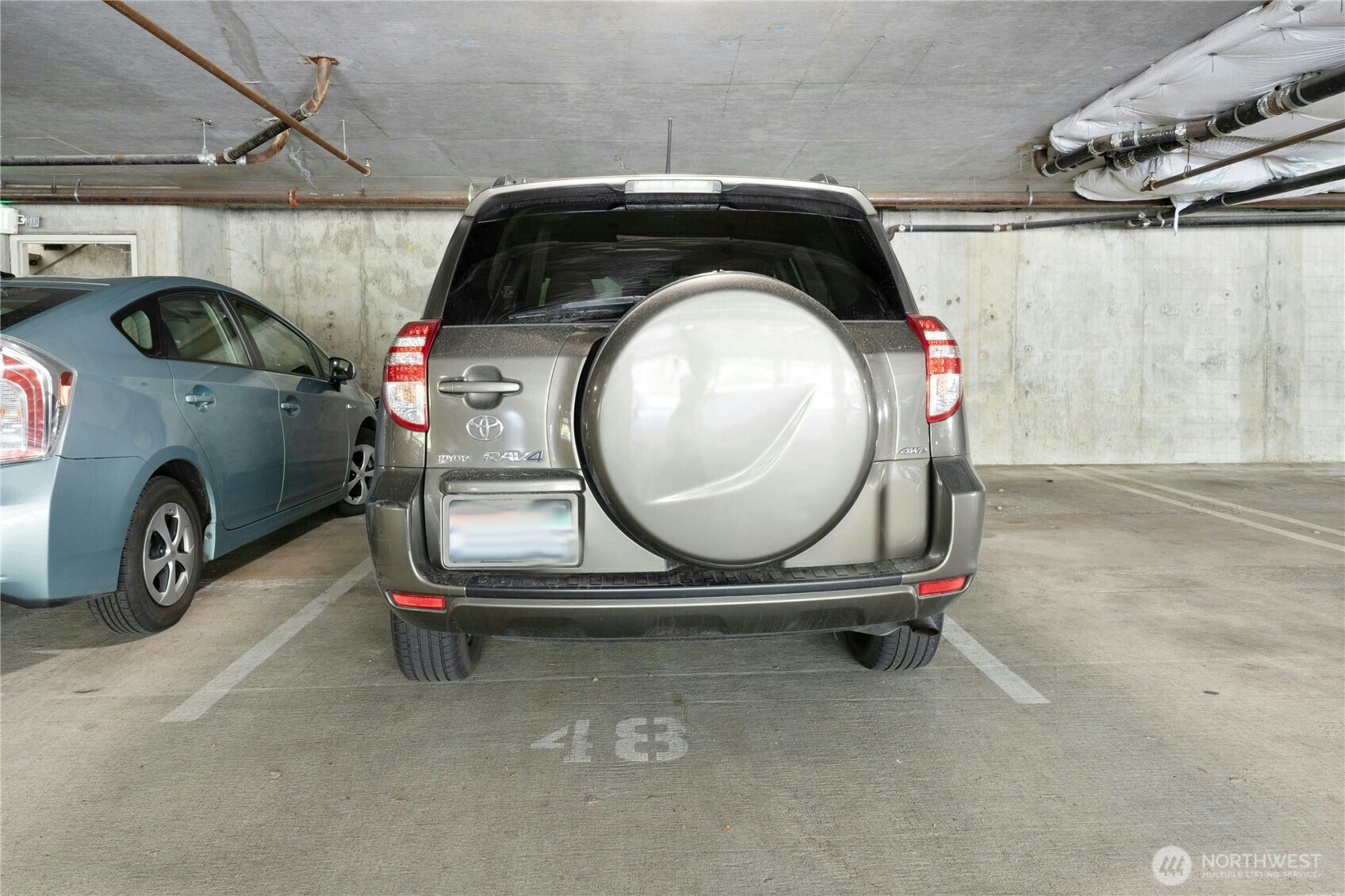 17426 Bothell Way Northeast, Unit A105 Bothell, WA 98011 - Photo 25 of 29 a view of a car in garage