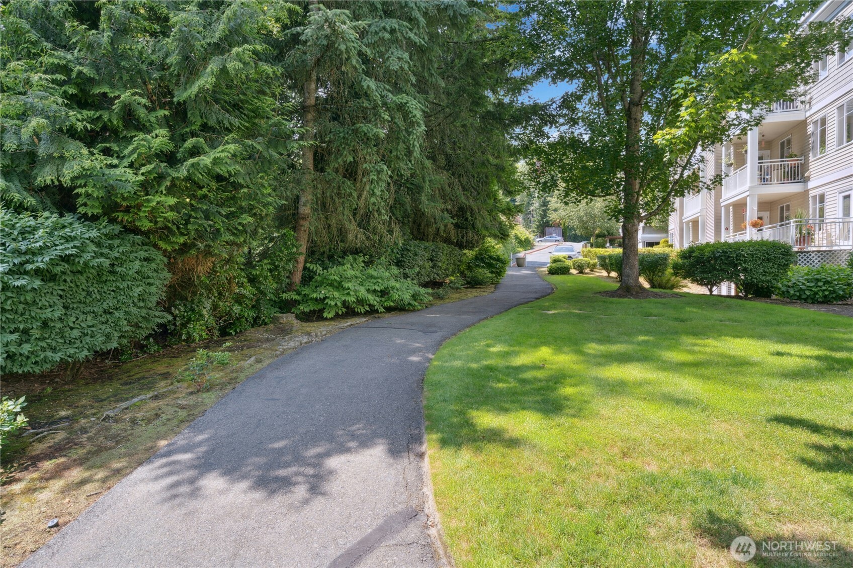 17426 Bothell Way Northeast, Unit A105 Bothell, WA 98011 - Photo 27 of 29 a view of a house with a yard