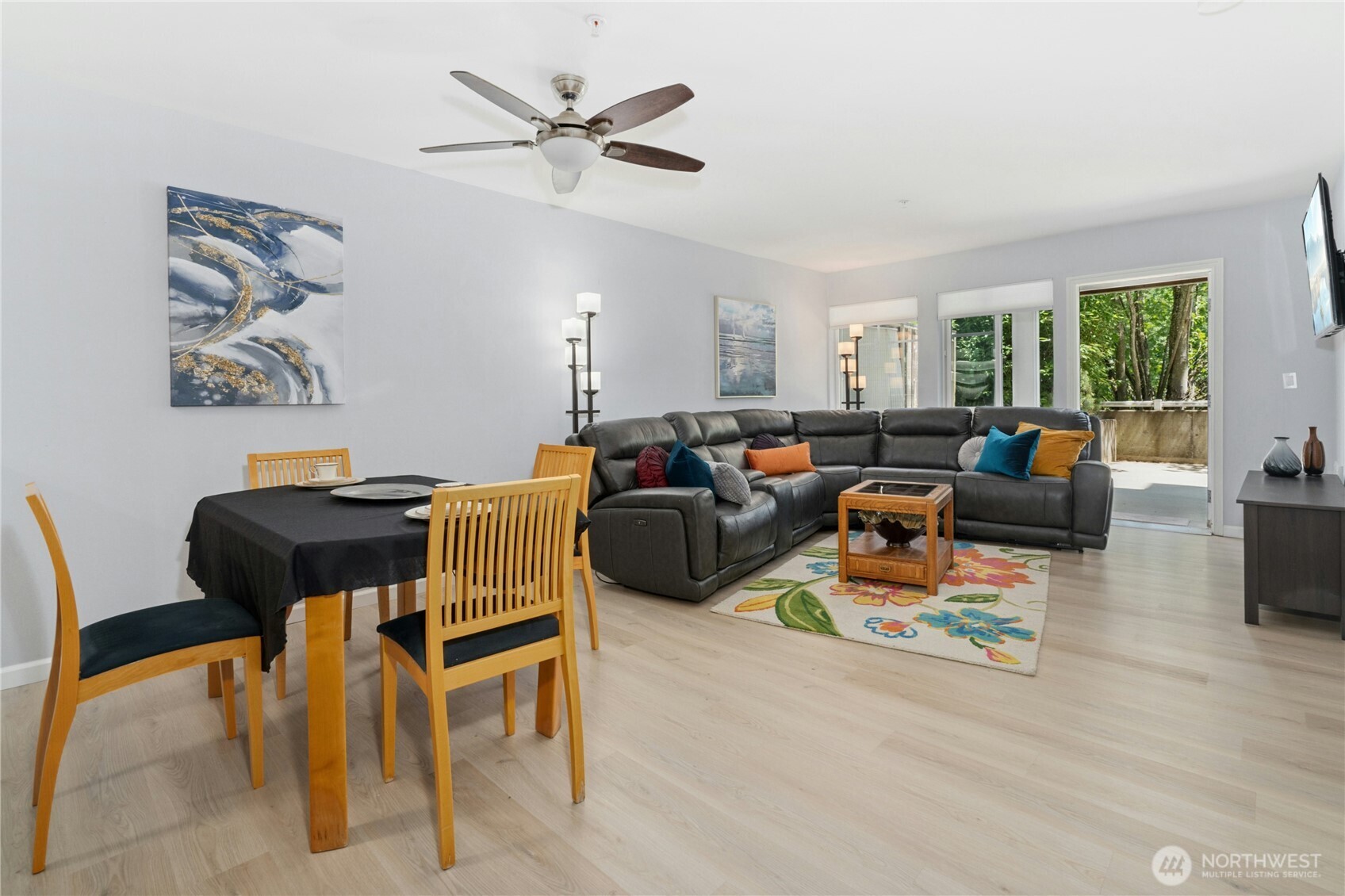 17426 Bothell Way Northeast, Unit A105 Bothell, WA 98011 - Photo 4 of 29 a living room with furniture and a large window