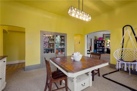 a view of a dining room with furniture