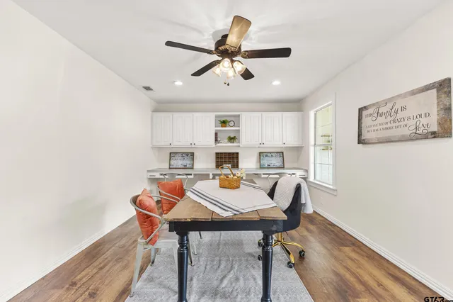 a view of a dining room with furniture