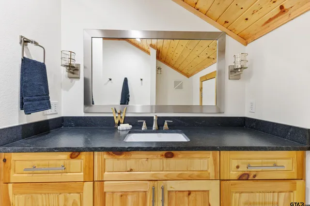 a kitchen with a sink and a window