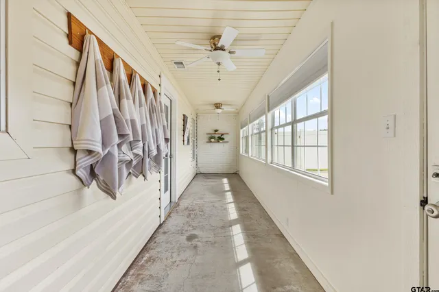 a view of entryway and hall with a window