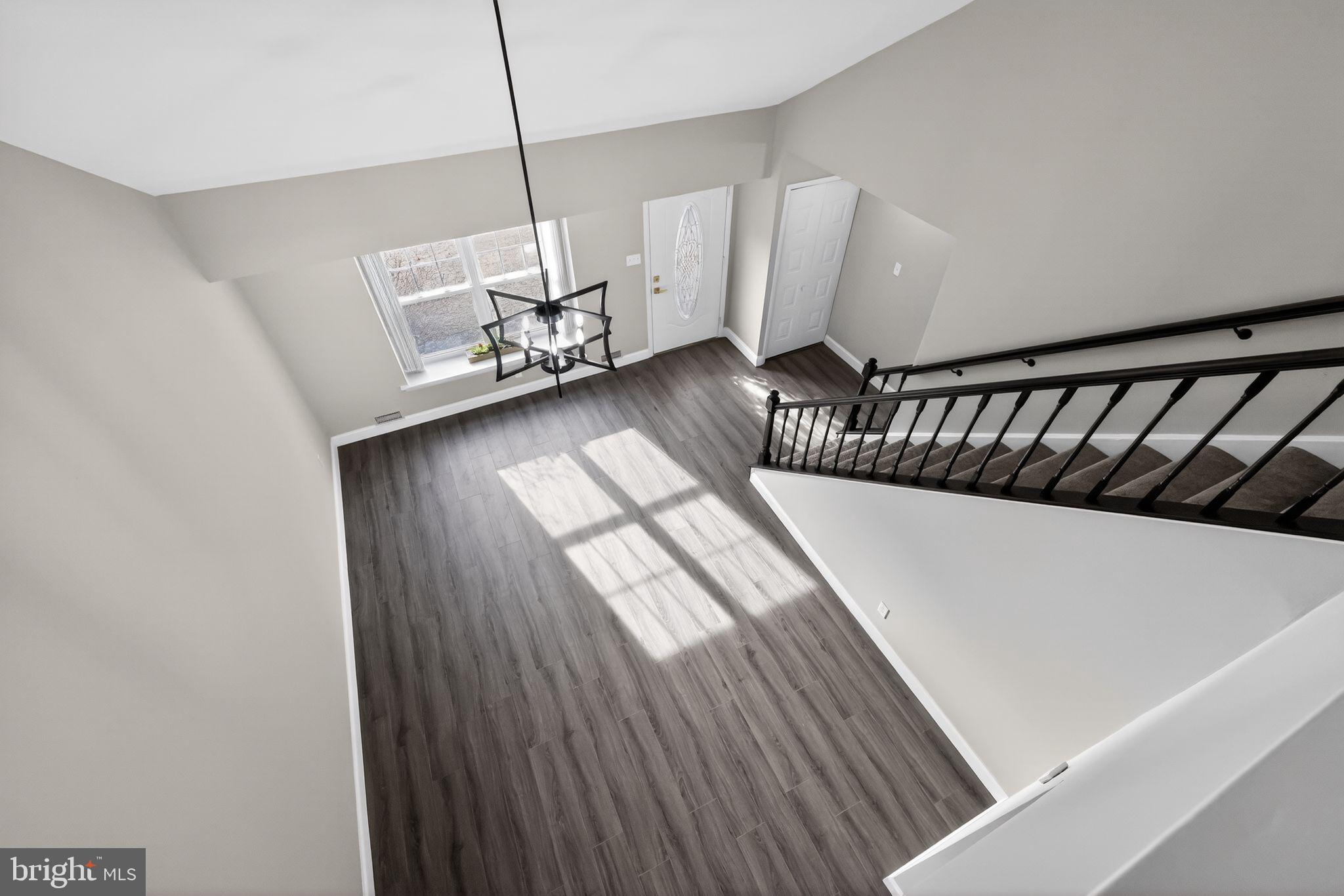55 Adams Street Swedesboro, NJ 08085 - Photo 15 of 30 a view of a room with wooden floor