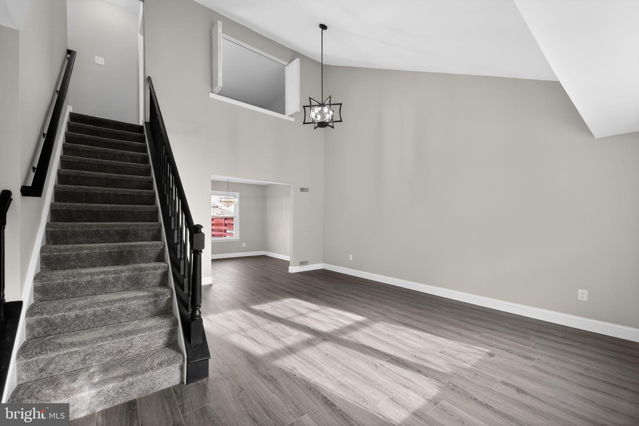 55 Adams Street Swedesboro, NJ 08085 - Photo 16 of 30 a view of entryway and hall with wooden floor