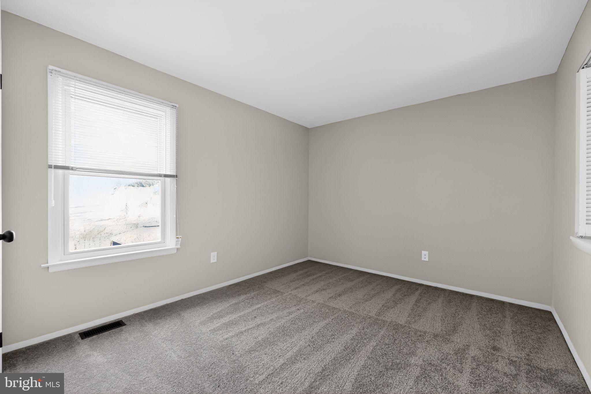 55 Adams Street Swedesboro, NJ 08085 - Photo 19 of 30 an empty room with windows