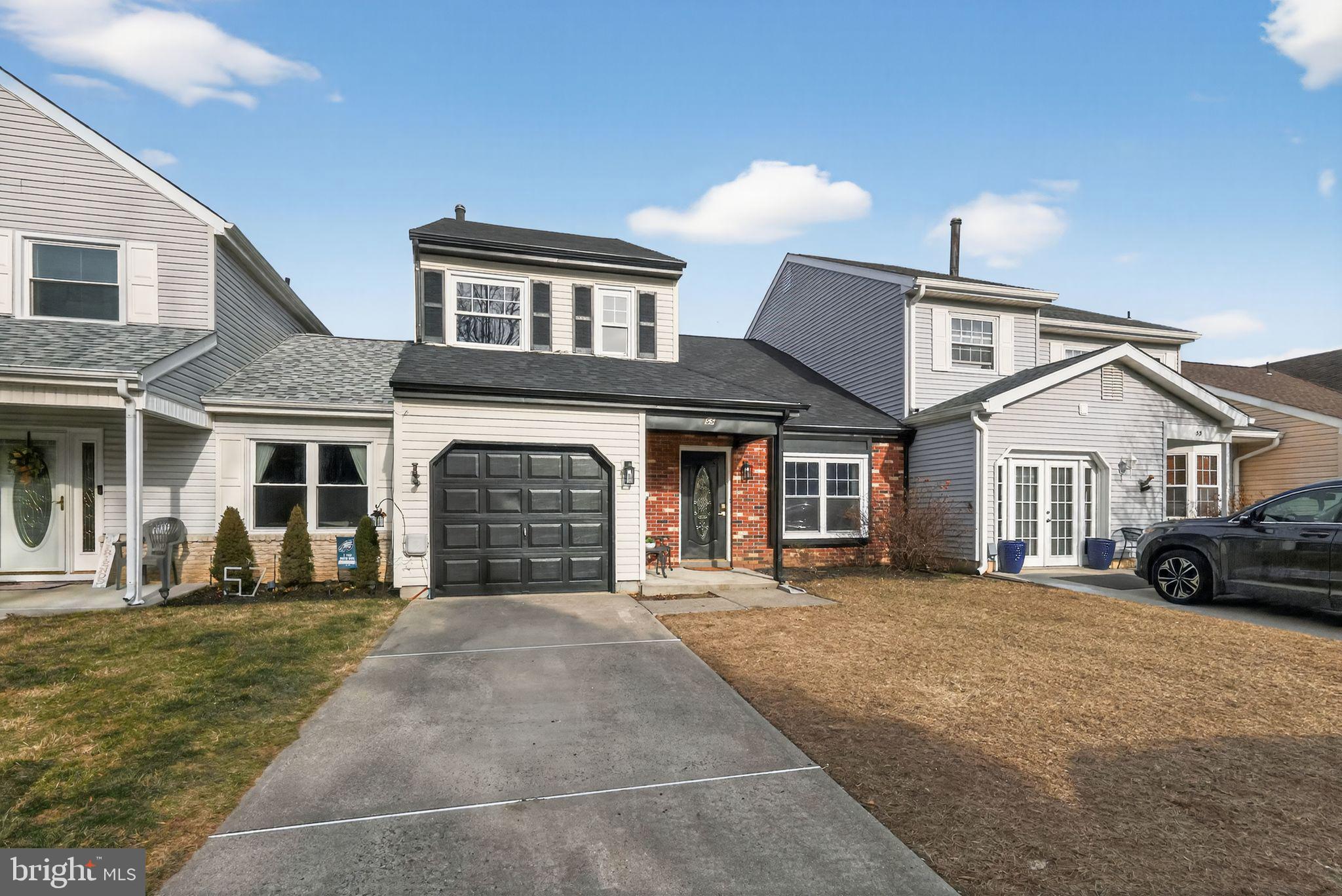 55 Adams Street Swedesboro, NJ 08085 - Photo 2 of 30 a front view of a house with a yard