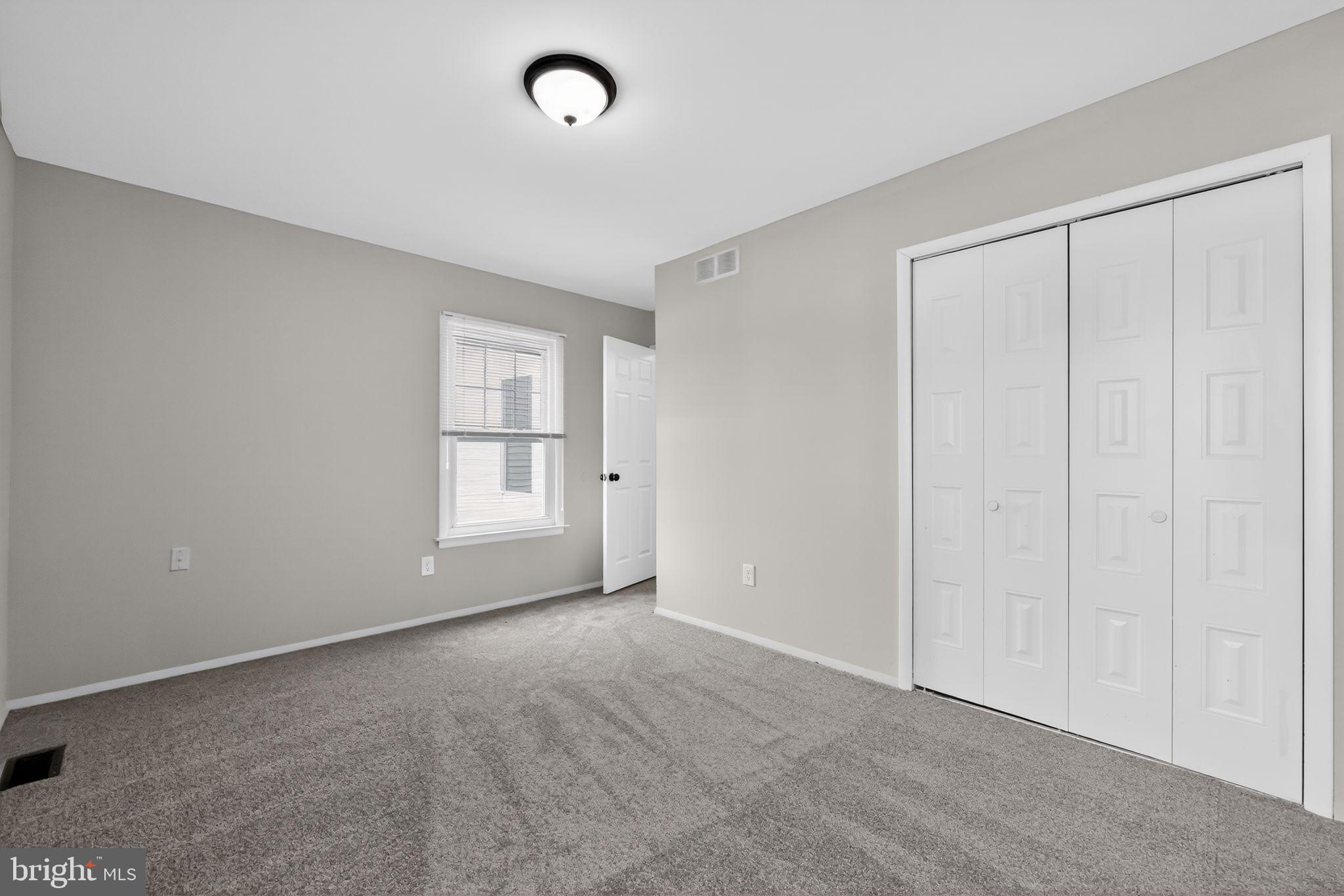 55 Adams Street Swedesboro, NJ 08085 - Photo 21 of 30 a view of an empty room with a window