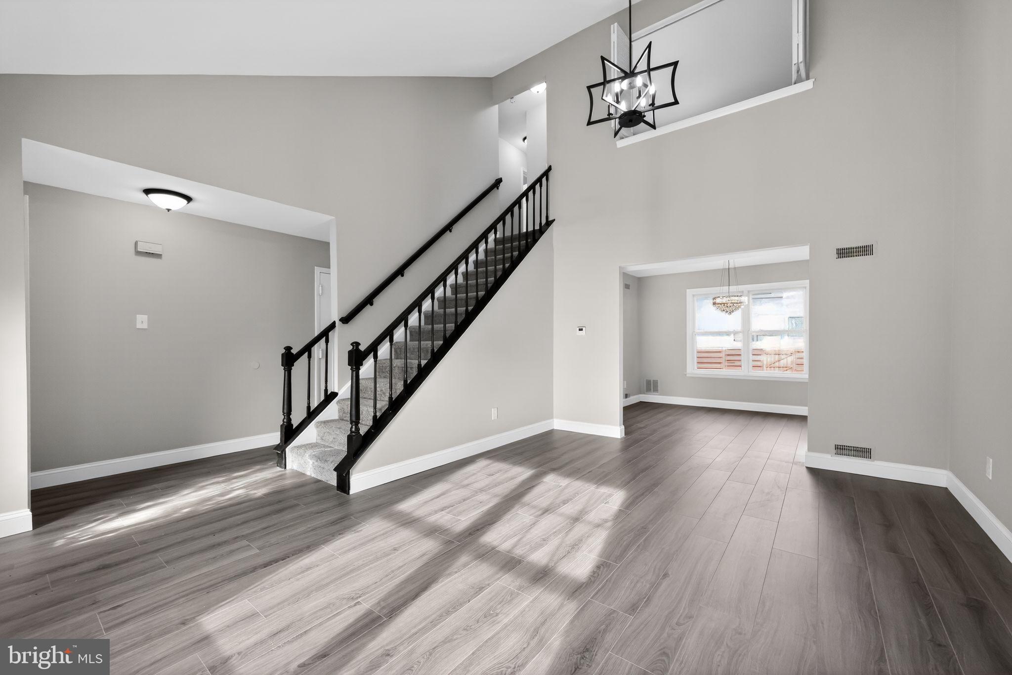 55 Adams Street Swedesboro, NJ 08085 - Photo 4 of 30 a view of entryway with wooden floor