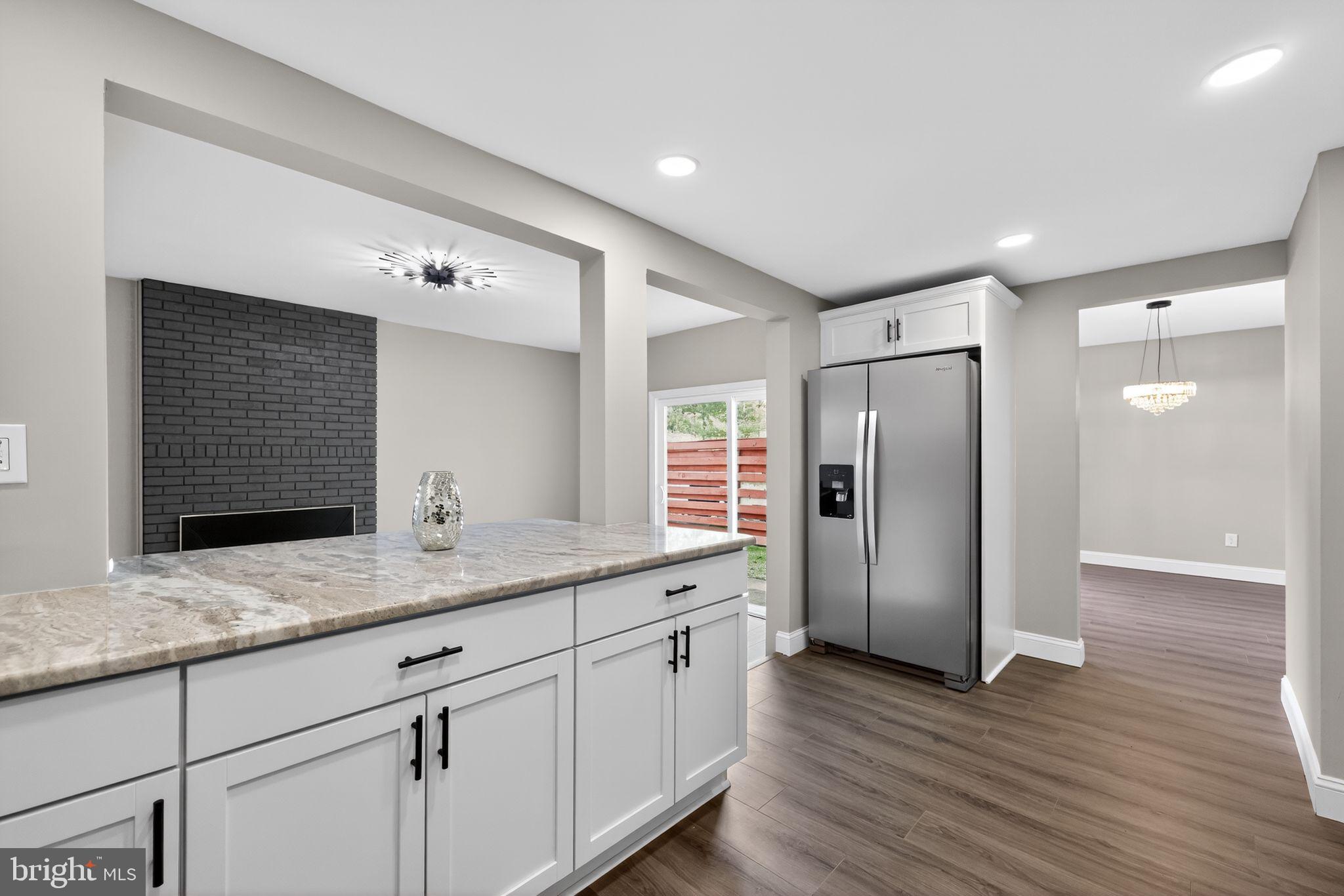 55 Adams Street Swedesboro, NJ 08085 - Photo 9 of 30 a kitchen with stainless steel appliances granite countertop a refrigerator and a sink