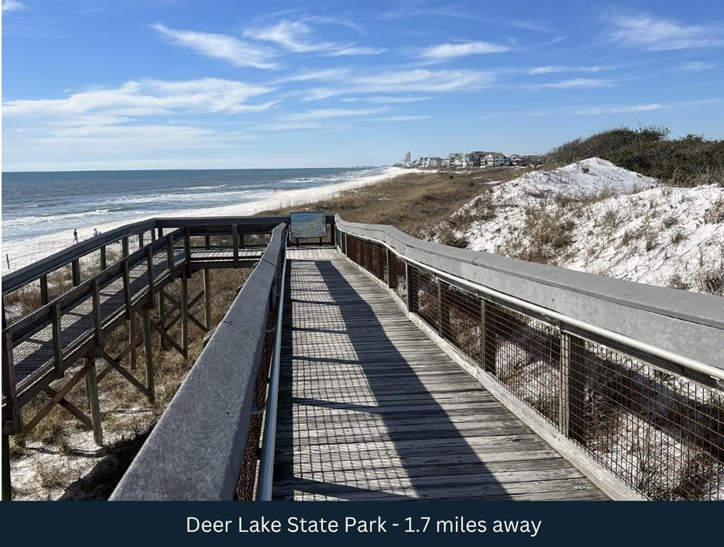 51 Cove Creek Lane Inlet Beach, FL 32461 - Photo 20 of 26 a view of balcony with wooden floor and ocean view